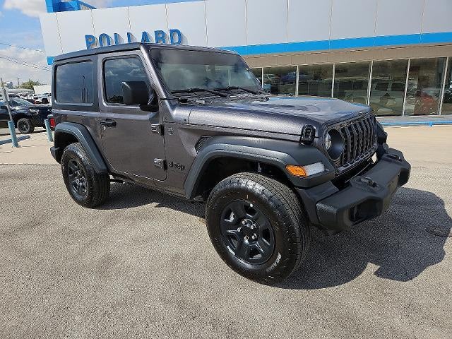 2025 Jeep Wrangler Sport in Black — front three-quarter view